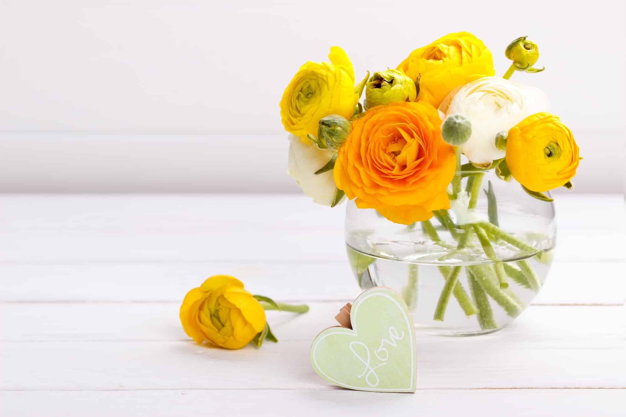 Wooden heart and flowers